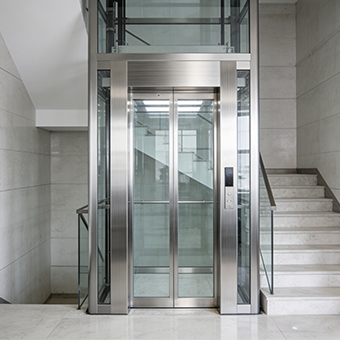 Brushed Stainless Steel Glass Elevator